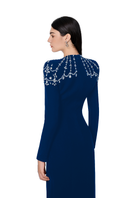 Navy blue Tracy Studio long sleeve bodycon gown with trapezoid neckline, fitted silhouette, and elegant design.