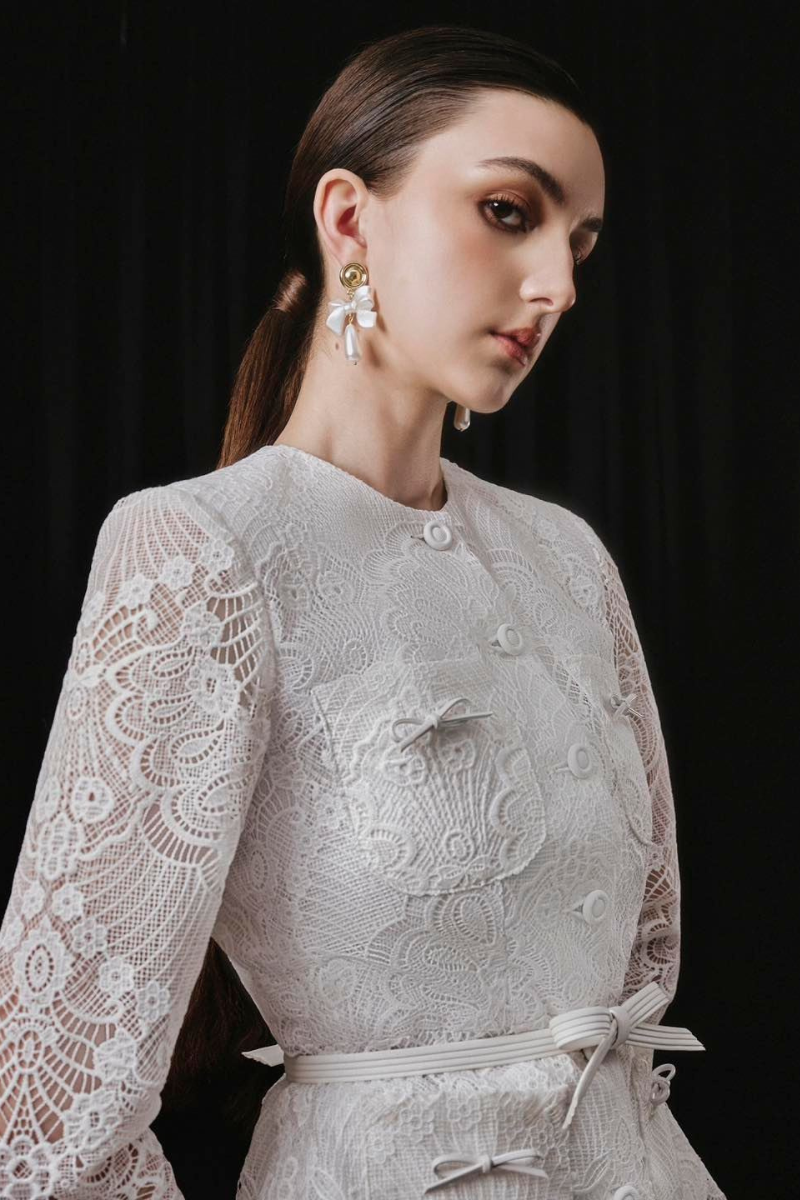 White Plan SOVEN top and NOVEN skirt co-ords set, featuring matching stylish and comfortable clothing pieces for women.