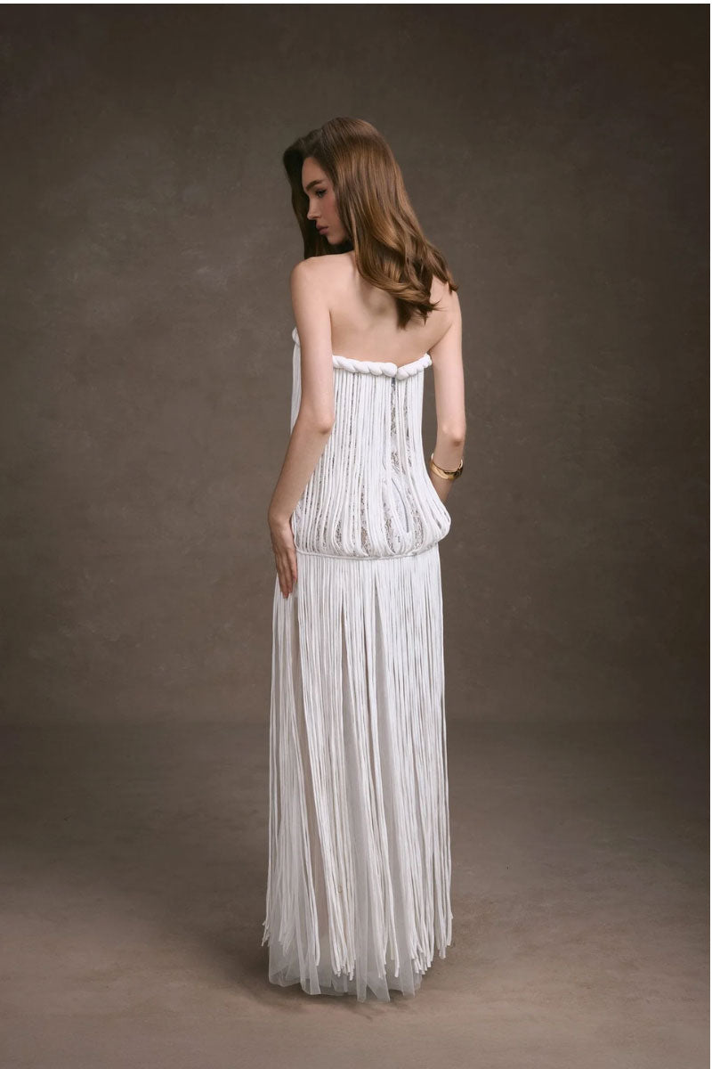 Keira Tong fringe lace maxi dress featuring a fitted corset top and flowing skirt with intricate lace details.