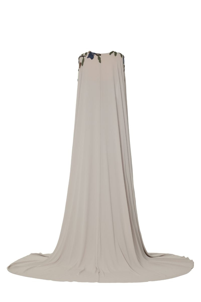 Elegant GERTIE Mink gown by Tarık Ediz displayed on a ghost mannequin, showing the back view of this luxurious evening dress.