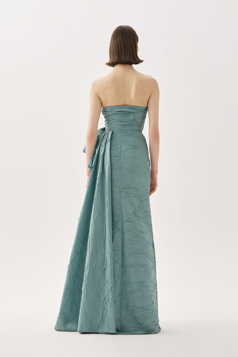 Tarık Ediz Marlow gown in Blue Haze featuring elegant fabric and a flowing silhouette, perfect for formal occasions.
