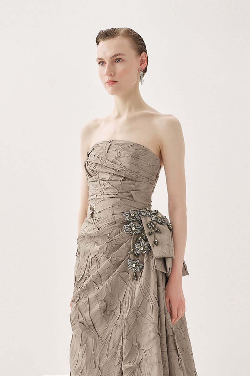 Elegant Tarık Ediz Marlow Mink gown with flowing fabric and intricate detailing, perfect for formal occasions.