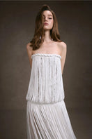 Keira Tong fringe lace maxi dress featuring a stylish corset design with intricate lace details and flowing fabric.