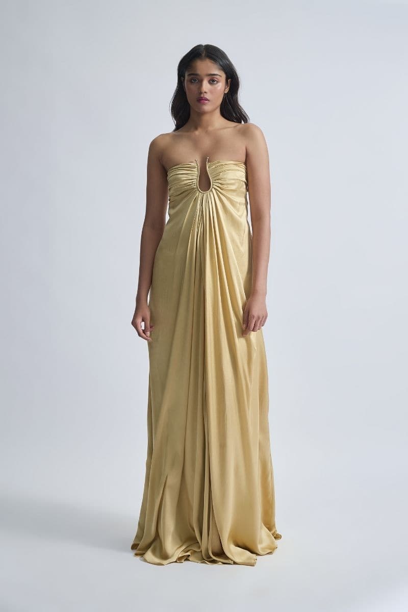 Deme by Gabriella CULT MIA X DEME maxi gown featuring elegant flowing fabric and intricate detail, worn by a model.