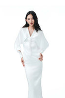 Do Long Ivory Mist midi dress featuring a flowy fabric and elegant design, perfect for stylish occasions.