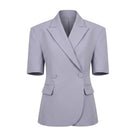 Keira Tong grey short-sleeve blazer with tailored fit, notched lapels, and sleek design, suitable for professional or casual wear.