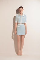 Valenciani mint tweed mini skirt featuring a stylish, textured design perfect for casual or dressy outfits.