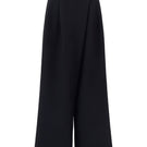 Black Arti Apparel Lyn Pants featuring a slim fit design and classic waistband, shown in a close-up image.