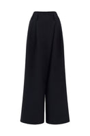 Black Arti Apparel Lyn Pants featuring a slim fit design and classic waistband, shown in a close-up image.