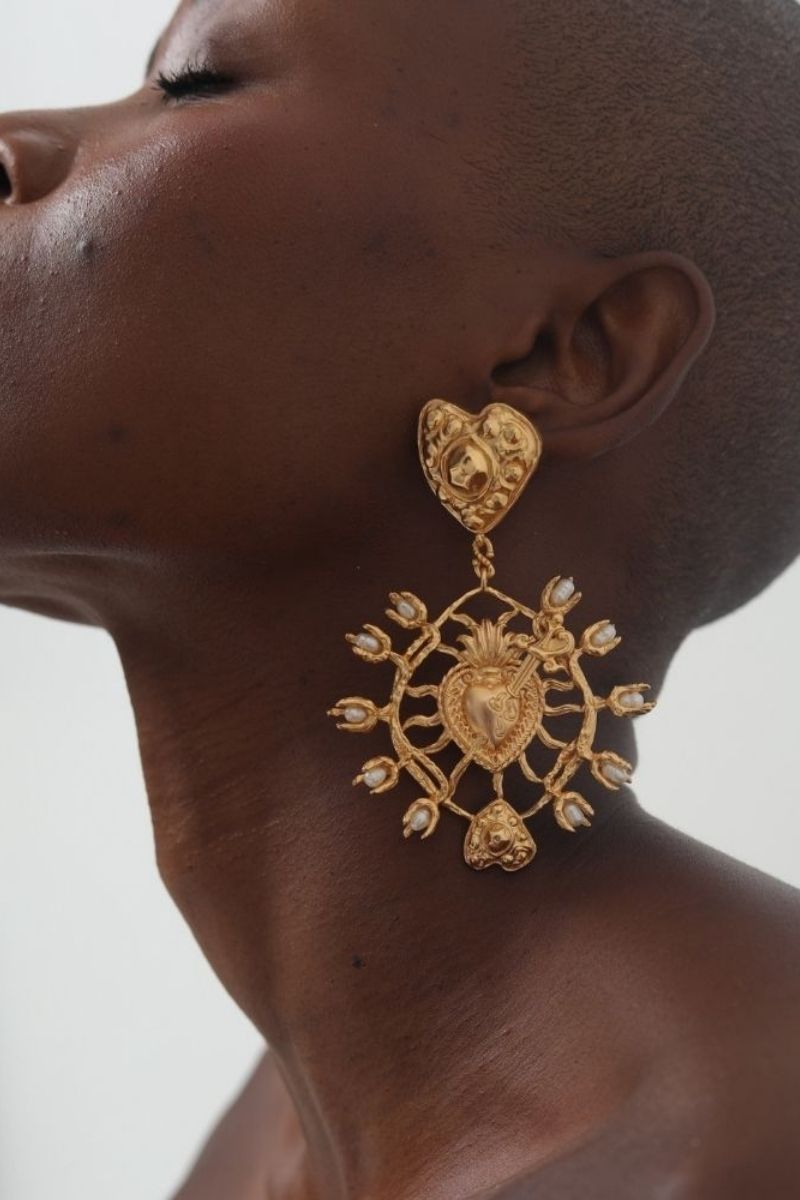 ANATINA Majorca earrings featuring gold-tone hoops with intricate detailing, stylish and elegant jewelry for women.