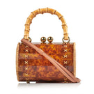 Waiwai Rio ALIX Bambu Bag in Turtle, a stylish top handle bag with a natural bamboo finish and turtle design detail.