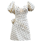 Do Long Rose Dot Mini Dress featuring a stylish mini dress with a rose dot pattern and fitted silhouette.