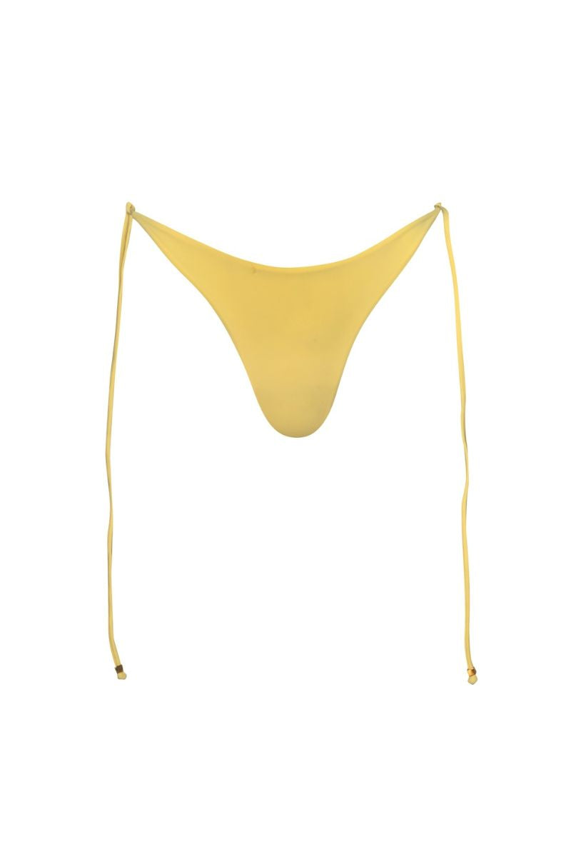 Baobab Itala bikini bottom in butter color, featuring a sleek, minimal design with adjustable side ties for a comfortable fit.