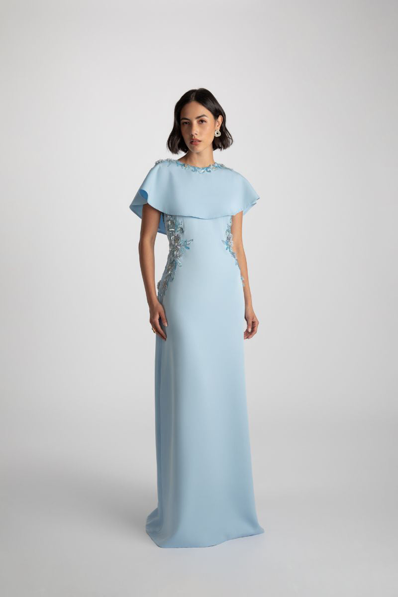 Elegant Jade gown by Raishma featuring intricate detailing and flowing fabric, perfect for formal occasions.