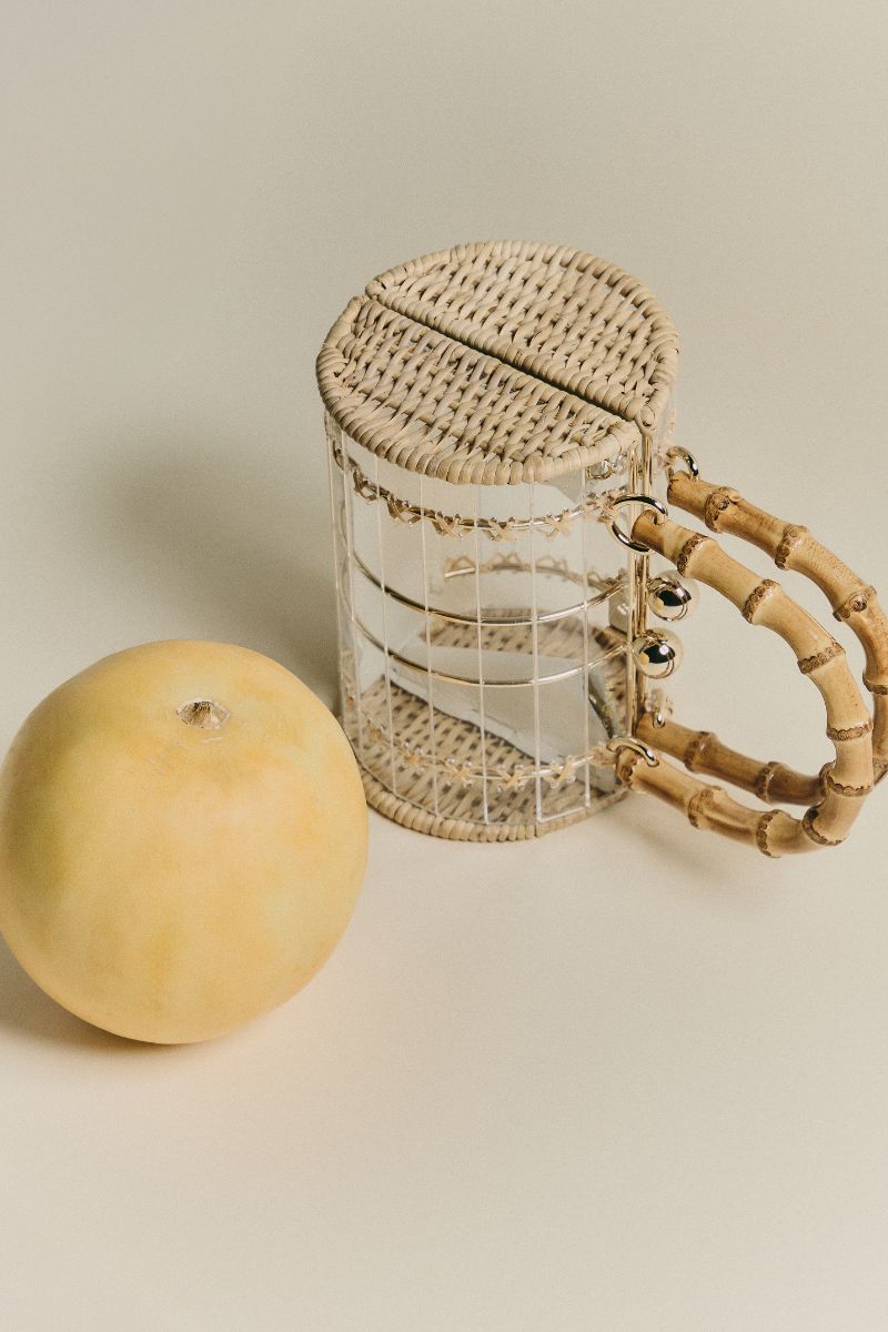 Waiwai Rio Alix Bambu Bag in Crystal, a stylish top handle bag with transparent bamboo design and elegant crystal accents.