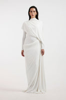 Deme By Gabriella Nadia white draped gown with elegant fabric and flowing silhouette, showcased in a full-length view.