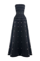 Black CULT MIA X HAPPY CLOTHING strapless gown with stone organza fabric, featuring a tiered design and elegant silhouette.