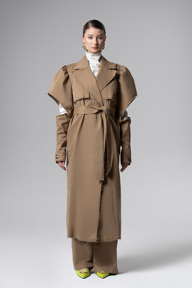 Liya belted puff-sleeve trench coat in beige with waist belt, double-breasted design, and classic collar, stylish outerwear for women.
