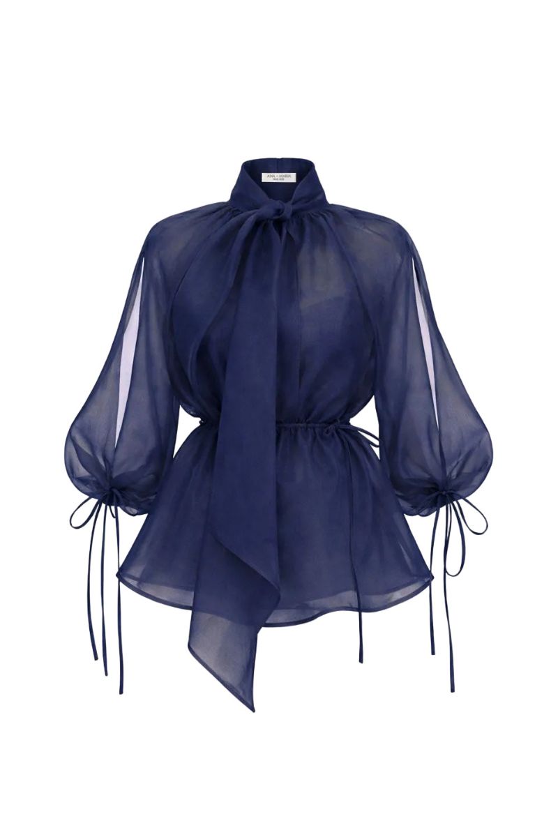 Navy blue Mousa blouse by Ana + Maria, featuring a stylish, lightweight top with a relaxed fit and subtle detailing.