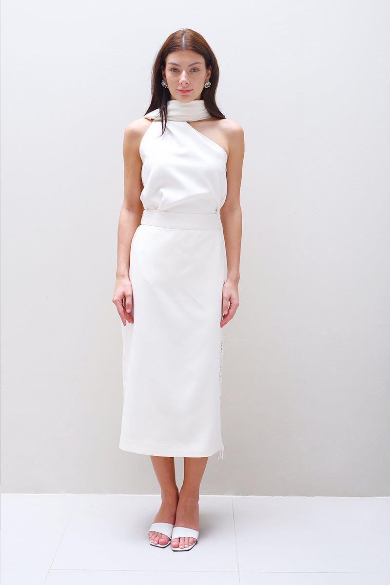 Cream Aidan & Ice Amira midi skirt with a flowy, elegant design, showcased in a stylish fashion photo.