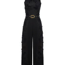 AISA Aurelia jumpsuit with wide legs and sleeveless design, shown in a stylish, casual outfit on a model.