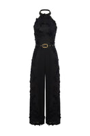 AISA Aurelia jumpsuit with wide legs and sleeveless design, shown in a stylish, casual outfit on a model.