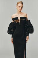 Elegant Rose's gown by Margée Atelier featuring intricate lace details and a flowing silhouette on a model.