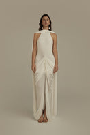 White POEM Elara maxi dress displayed on a hanger, featuring flowing fabric and elegant design for casual or formal occasions.