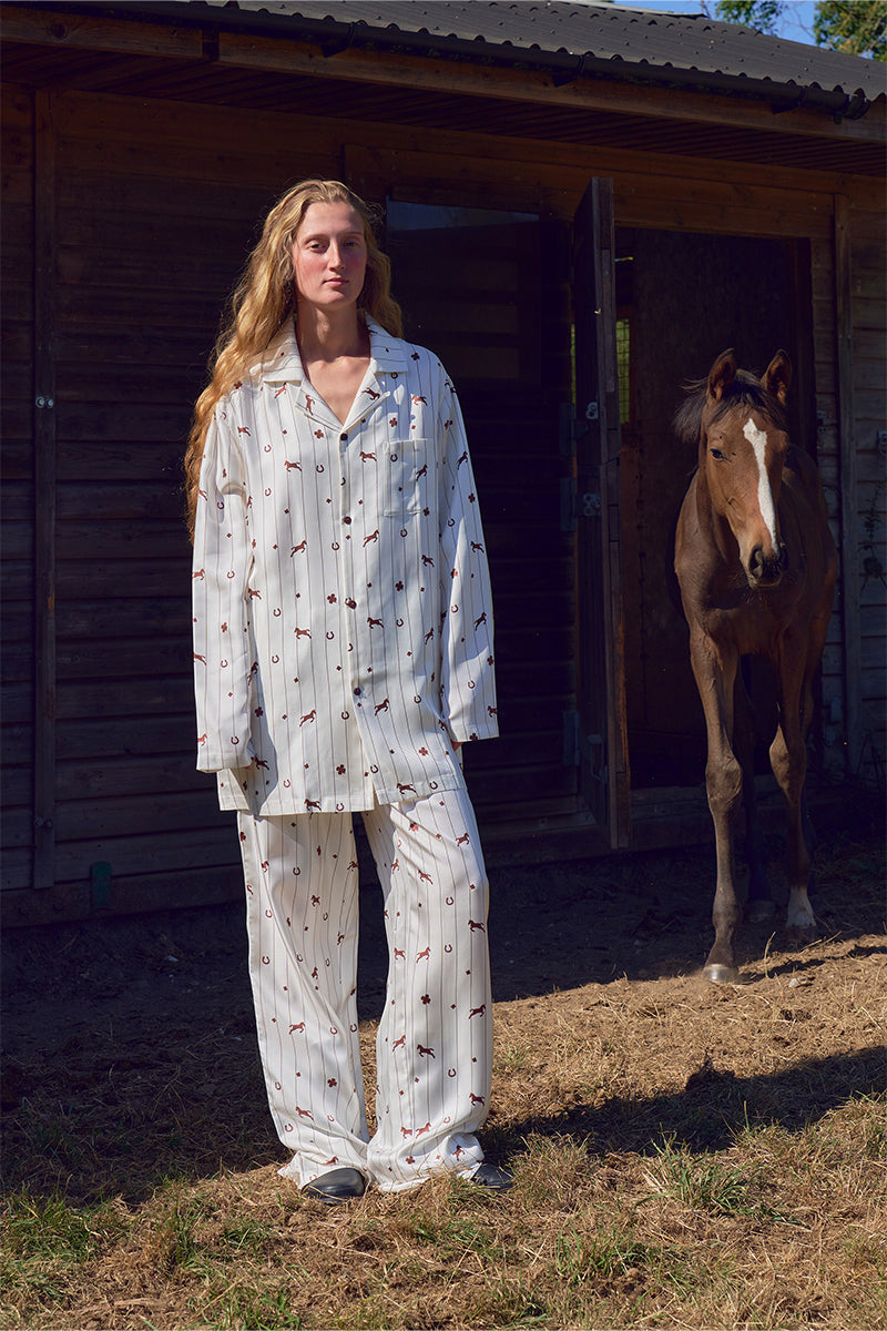 Unisex brown printed twill pajama set with long sleeves and pants, comfortable and stylish sleepwear by Not Just Pajama.