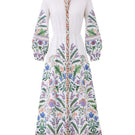 Raishma Angelina white maxi dress, flowing fabric and elegant design, shown on a model with a fitted waist and soft neckline.