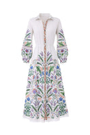Raishma Angelina white maxi dress, flowing fabric and elegant design, shown on a model with a fitted waist and soft neckline.