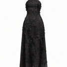 Black lace gown from 21Six's Alisa collection, featuring elegant detailing and a flowing silhouette.