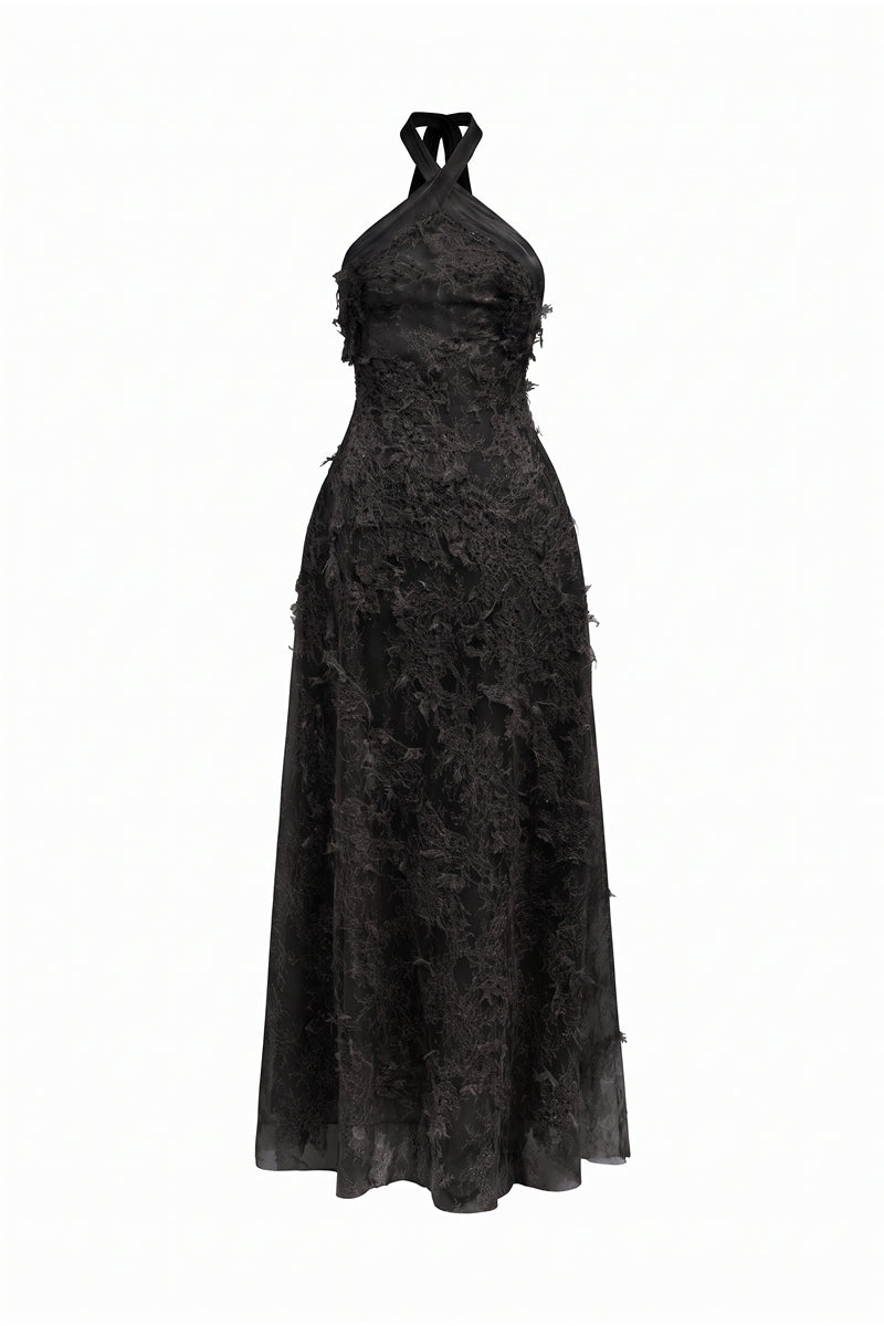 Black lace gown from 21Six's Alisa collection, featuring elegant detailing and a flowing silhouette.