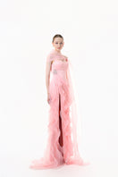 Blush pink draped ruffle gown by Happy Clothing featuring elegant fabric and flowing design with ruffle details.