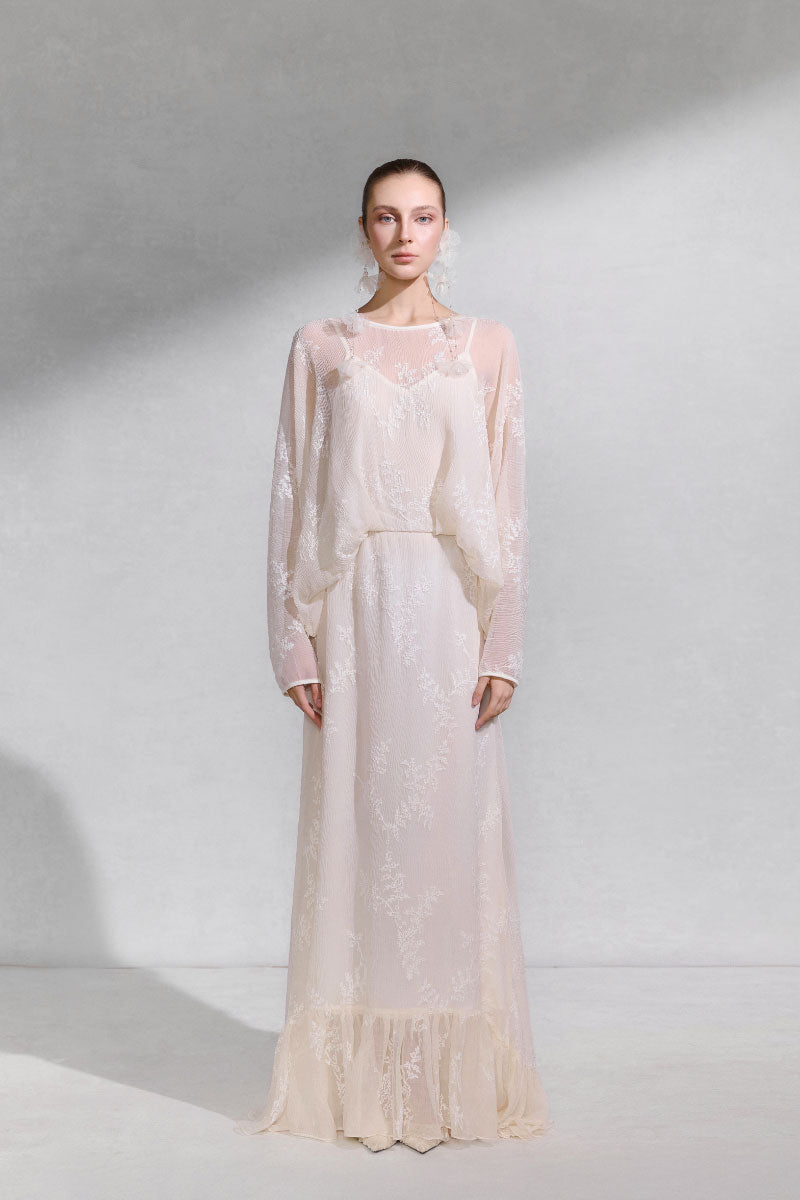 Arti Apparel Solara Maxi Dress in flowing fabric with a relaxed fit, featuring a stylish neckline and elegant design.
