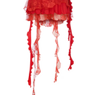 Sudi Etuz lace and jersey mini ruffled skirt with layered design and delicate lace details, styled for a chic look.