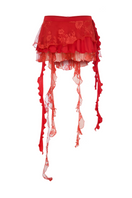 Sudi Etuz lace and jersey mini ruffled skirt with layered design and delicate lace details, styled for a chic look.