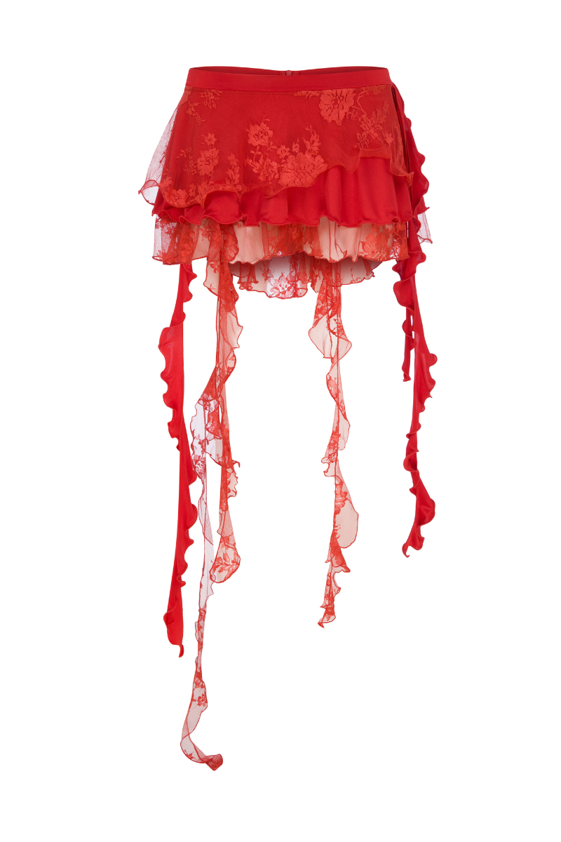 Sudi Etuz lace and jersey mini ruffled skirt with layered design and delicate lace details, styled for a chic look.