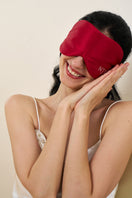 Red silk eye mask and pouch set from Not Just Pajama, soft and luxurious homeware accessories for relaxation.