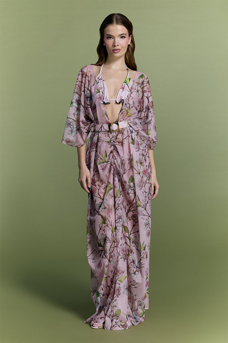 Nur Karaata Island Mirage cover-up featuring lightweight, flowy fabric with tropical print, perfect for beach or poolside wear.