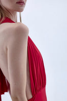 Nazlı Ceren INES long red jersey maxi dress displayed with flowing fabric and elegant design.