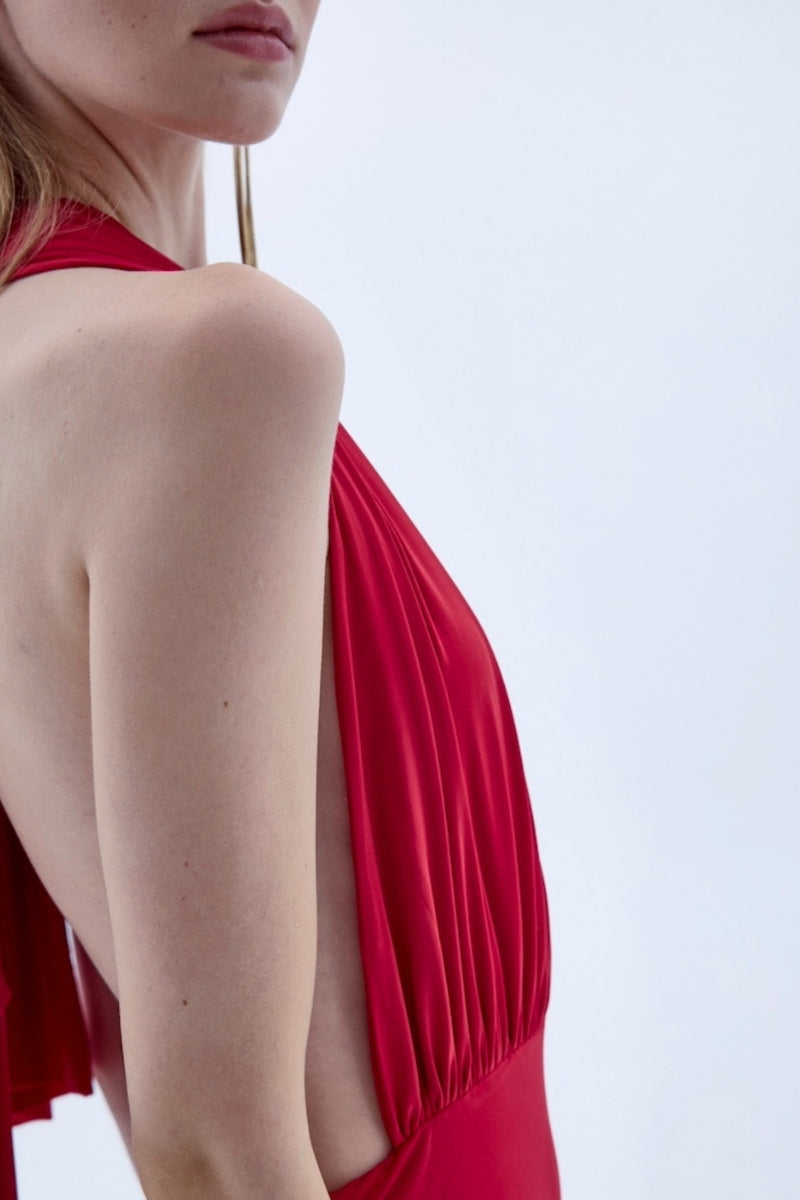 Nazlı Ceren INES long red jersey maxi dress displayed with flowing fabric and elegant design.