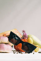 Moy Atelier Shadow Dark Knight sunglasses with black frames and tinted lenses, stylish eyewear for sun protection