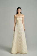 Beige off-shoulder organza gown by Happy Clothing featuring a stylish, flowing design perfect for elegant occasions.