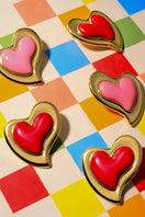 Liya HEARTFELT pink earrings featuring heart-shaped design and delicate craftsmanship, perfect for stylish accessories.