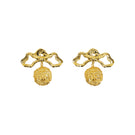 Gold bow earrings with lion motif by Natia x Lako, featuring intricate details and stylish design.