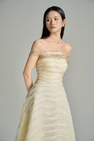 Beige CULT MIA X HAPPY CLOTHING off-shoulder organza gown, elegant long dress with flowing fabric and delicate design.