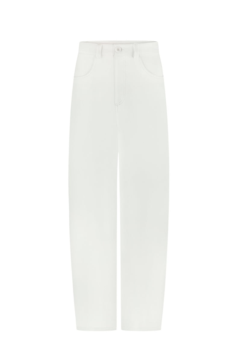Light milk-colored relaxed fit jeans by DELEGAN, shown hanging with a casual fit and subtle stitching details.