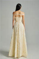 Beige CULT MIA X HAPPY CLOTHING off-shoulder organza gown, elegant formal dress with flowing fabric and delicate details.