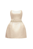 Beige I.H.F Studio bustier mini dress displayed on a hanger, showcasing its fitted bodice and stylish design.